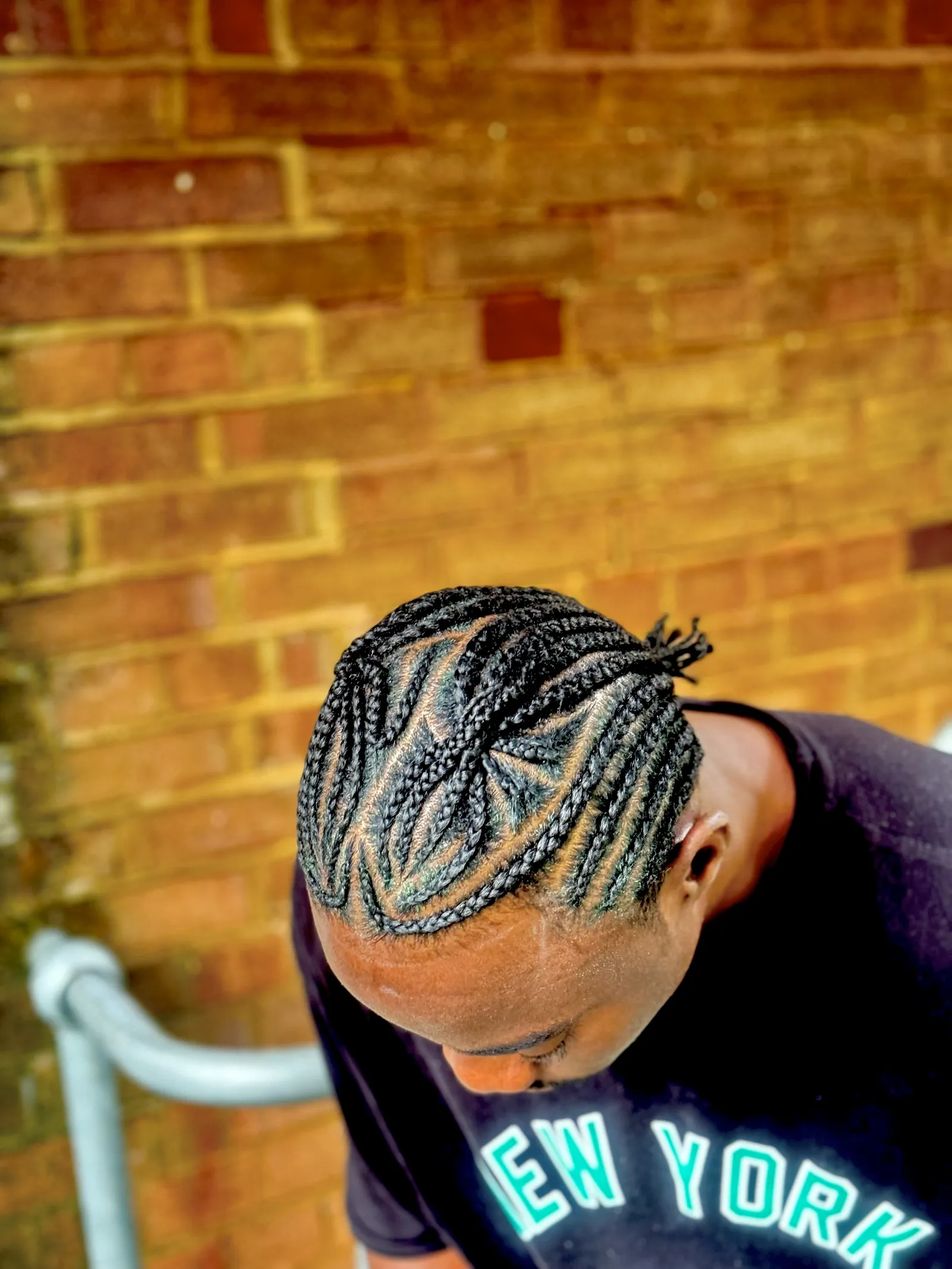 Men's cornrows, top-side view