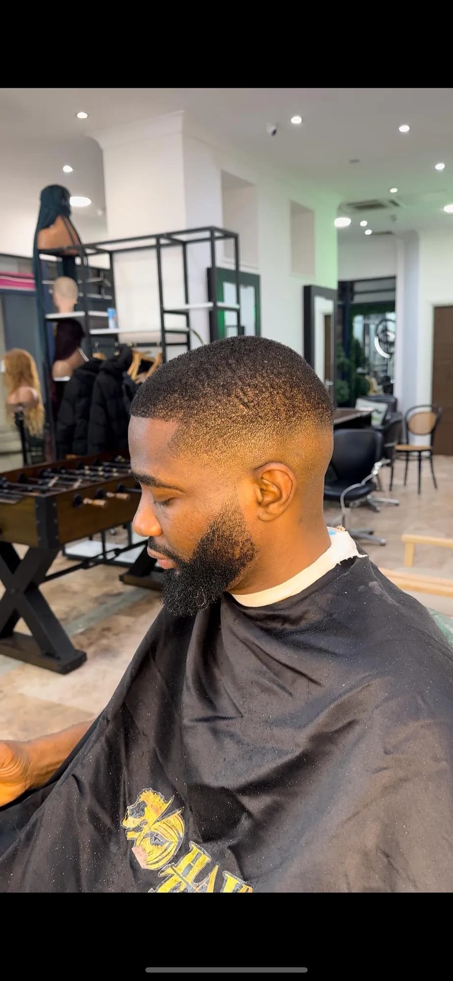 Men's fade with a sculpted beard
