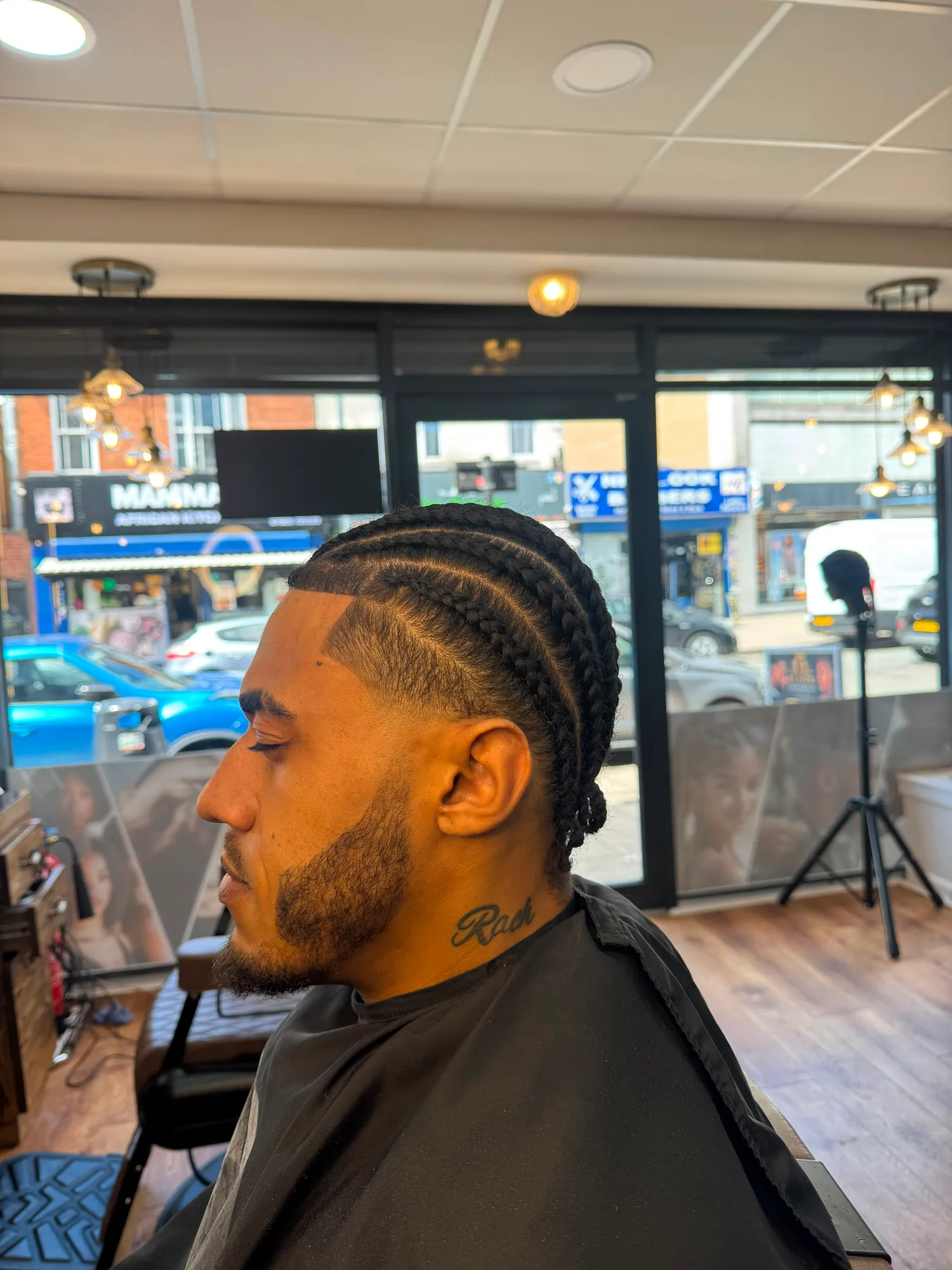 Men's cornrows with a clean fade