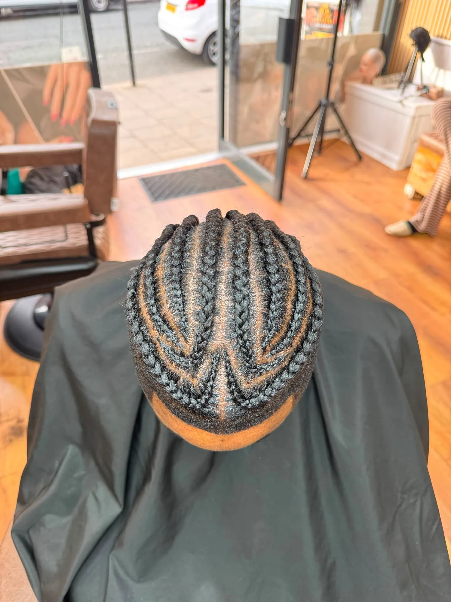 Men's straight-back cornrows, top view