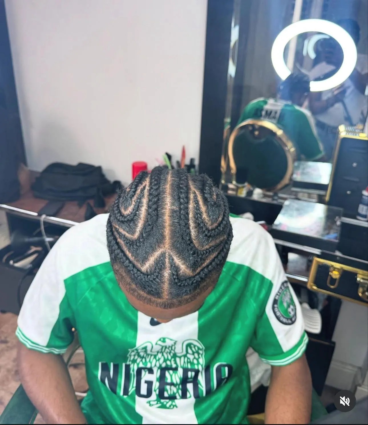 Men's patterned cornrows, top view