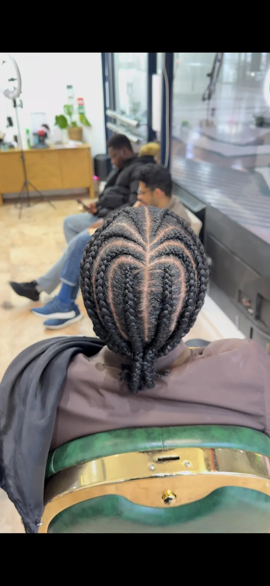 Men's chunky feed-in cornrows, back view