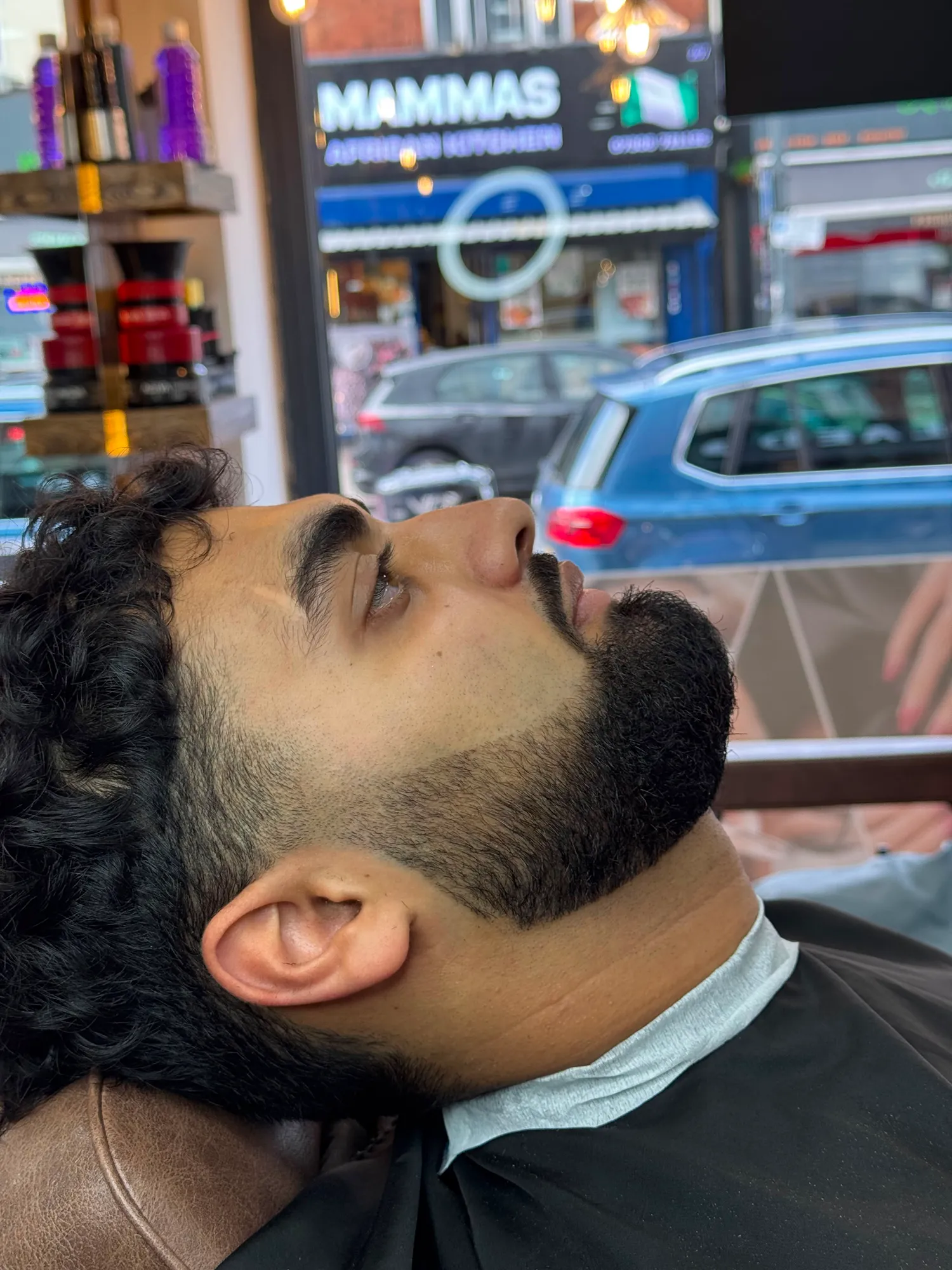 Sharp beard line-up, close detail