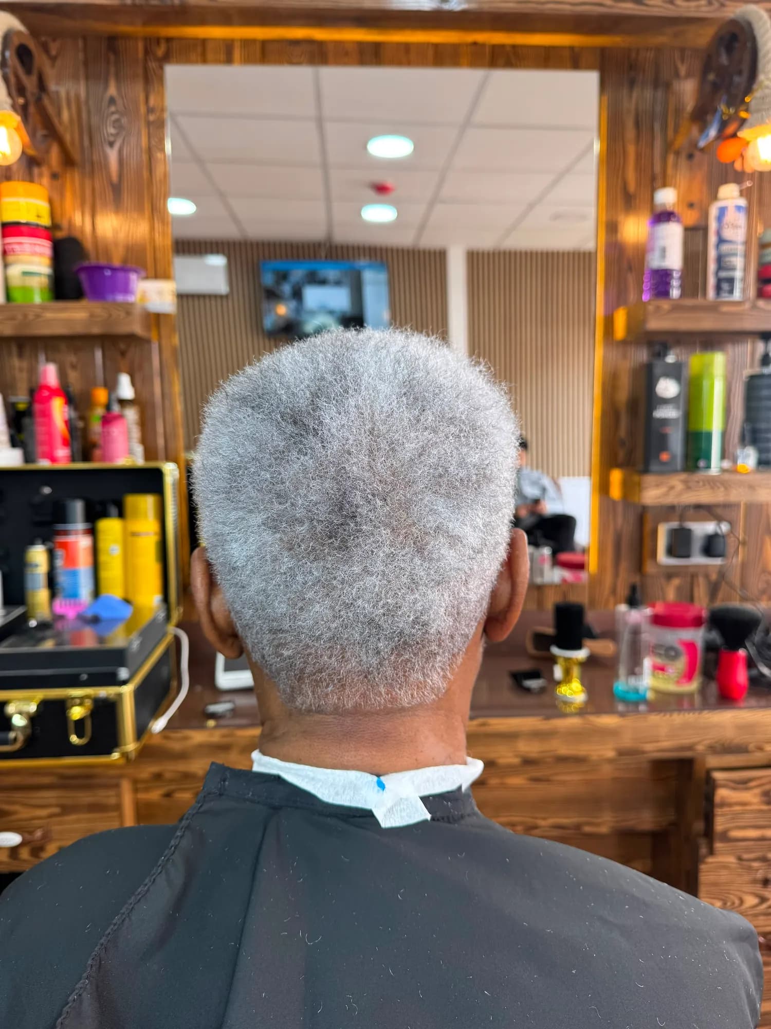 Silver afro cut, back view