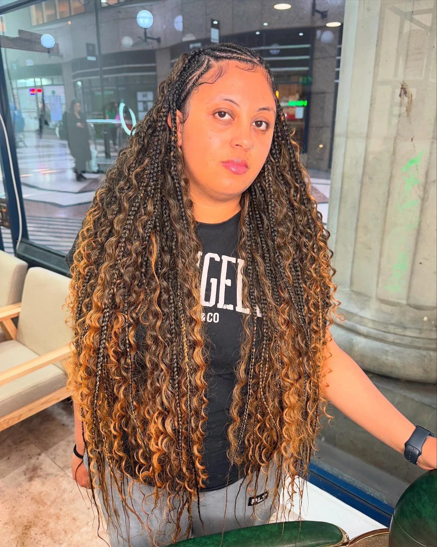 Long boho knotless braids with curly ends