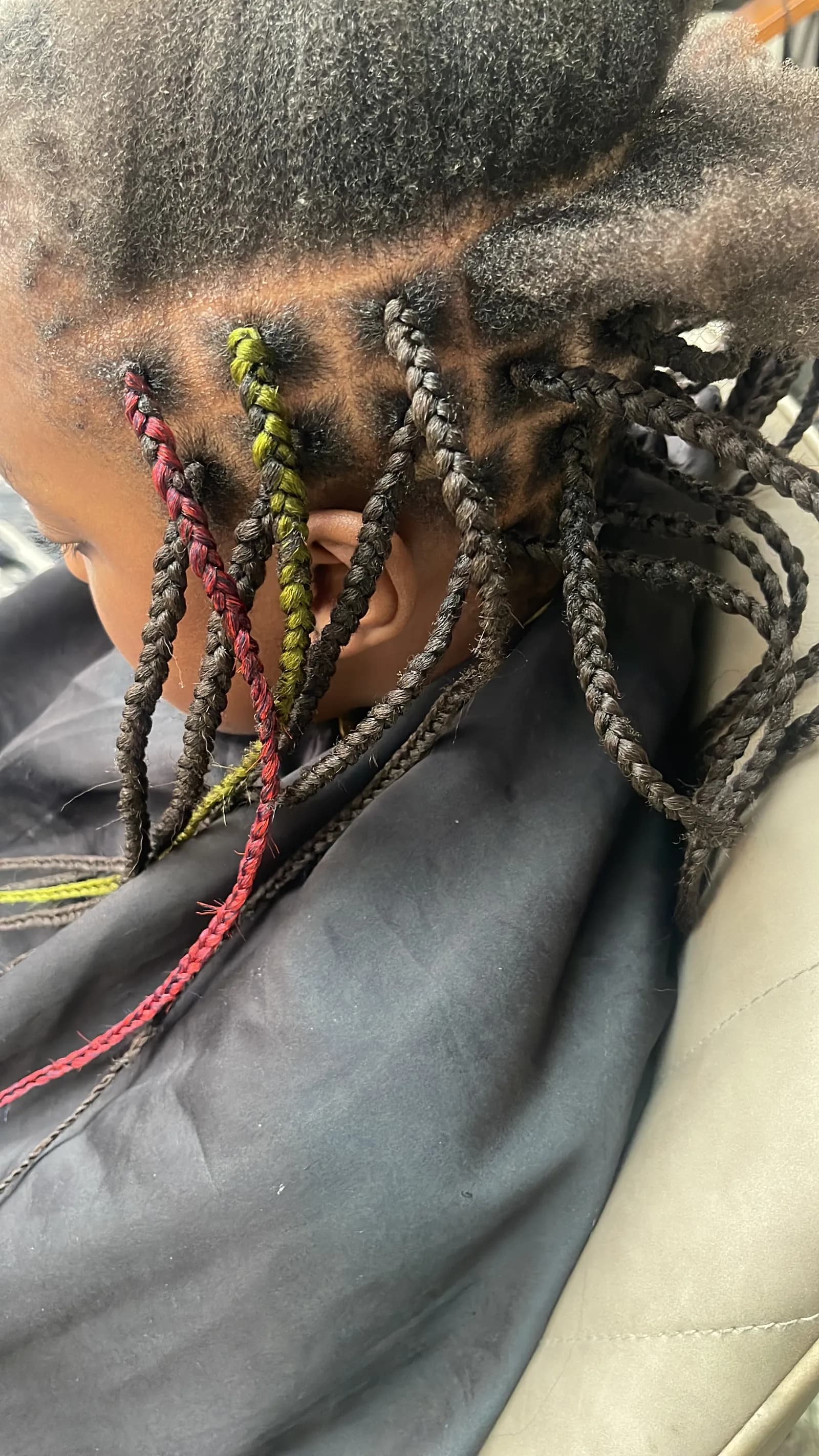 Knotless braids with a clean parting
