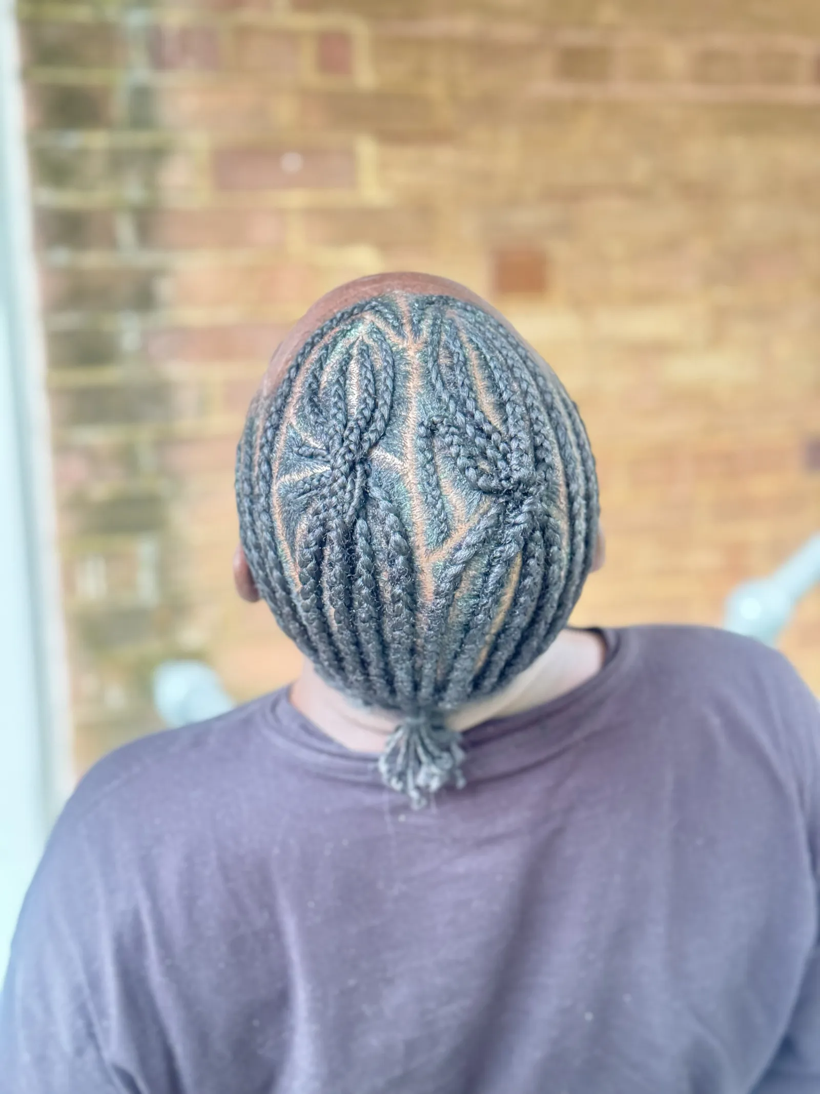 Patterned cornrow design