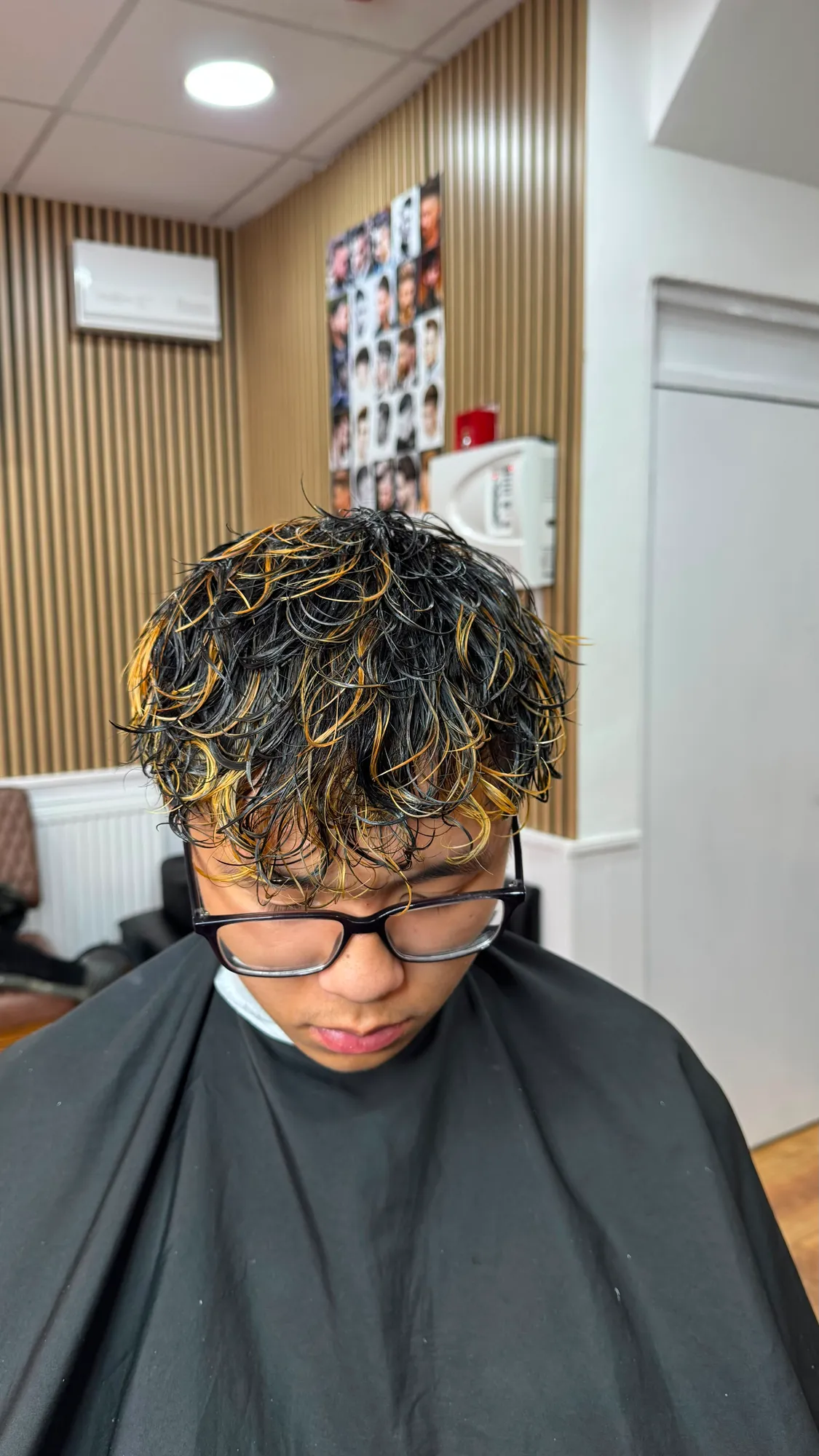Men's perm with gold highlights, front view