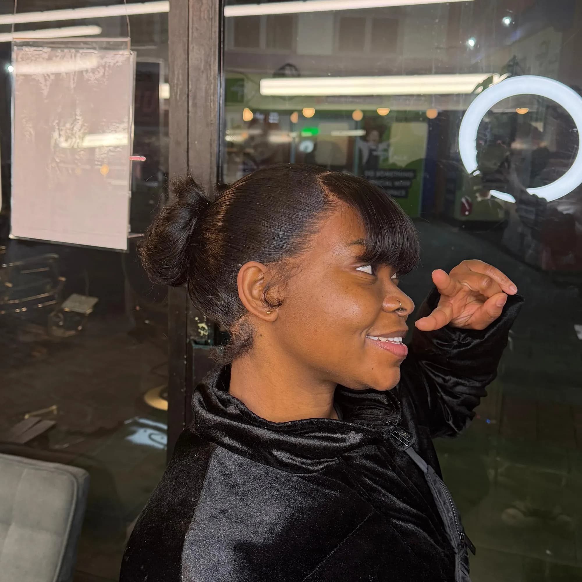 Sleek bun and fringe, front view