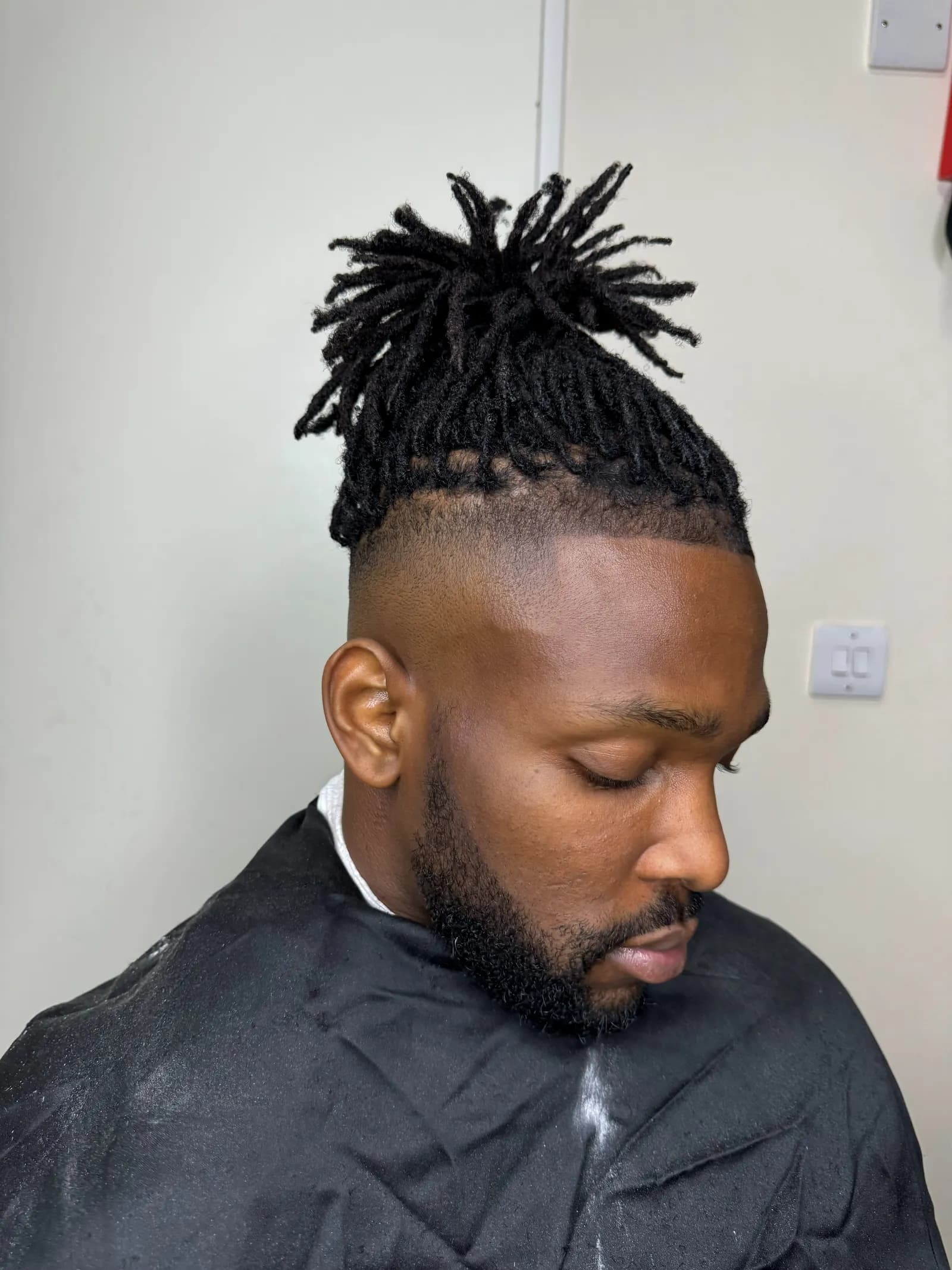 Short locs with a fade