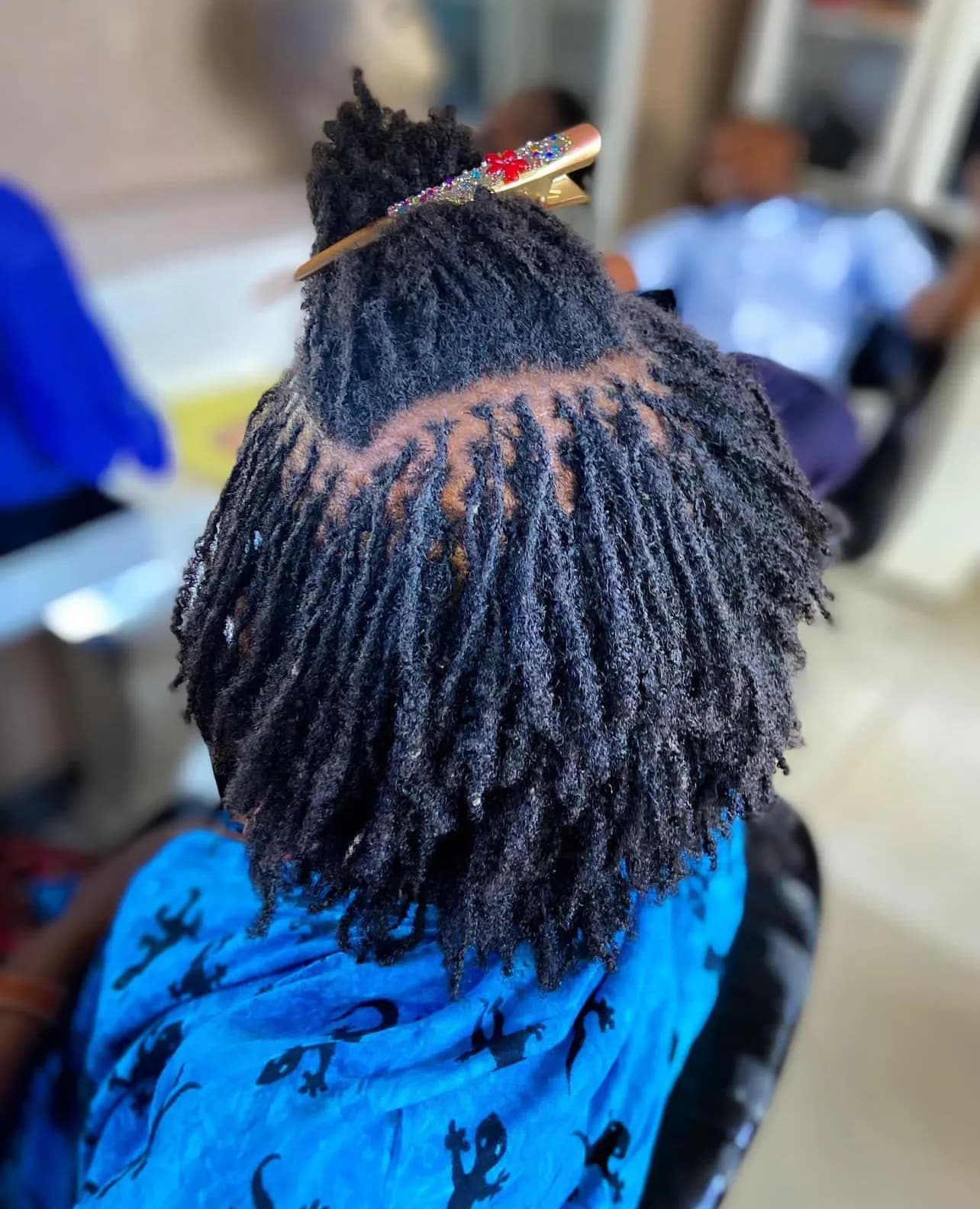 Goddess faux locs with curly ends
