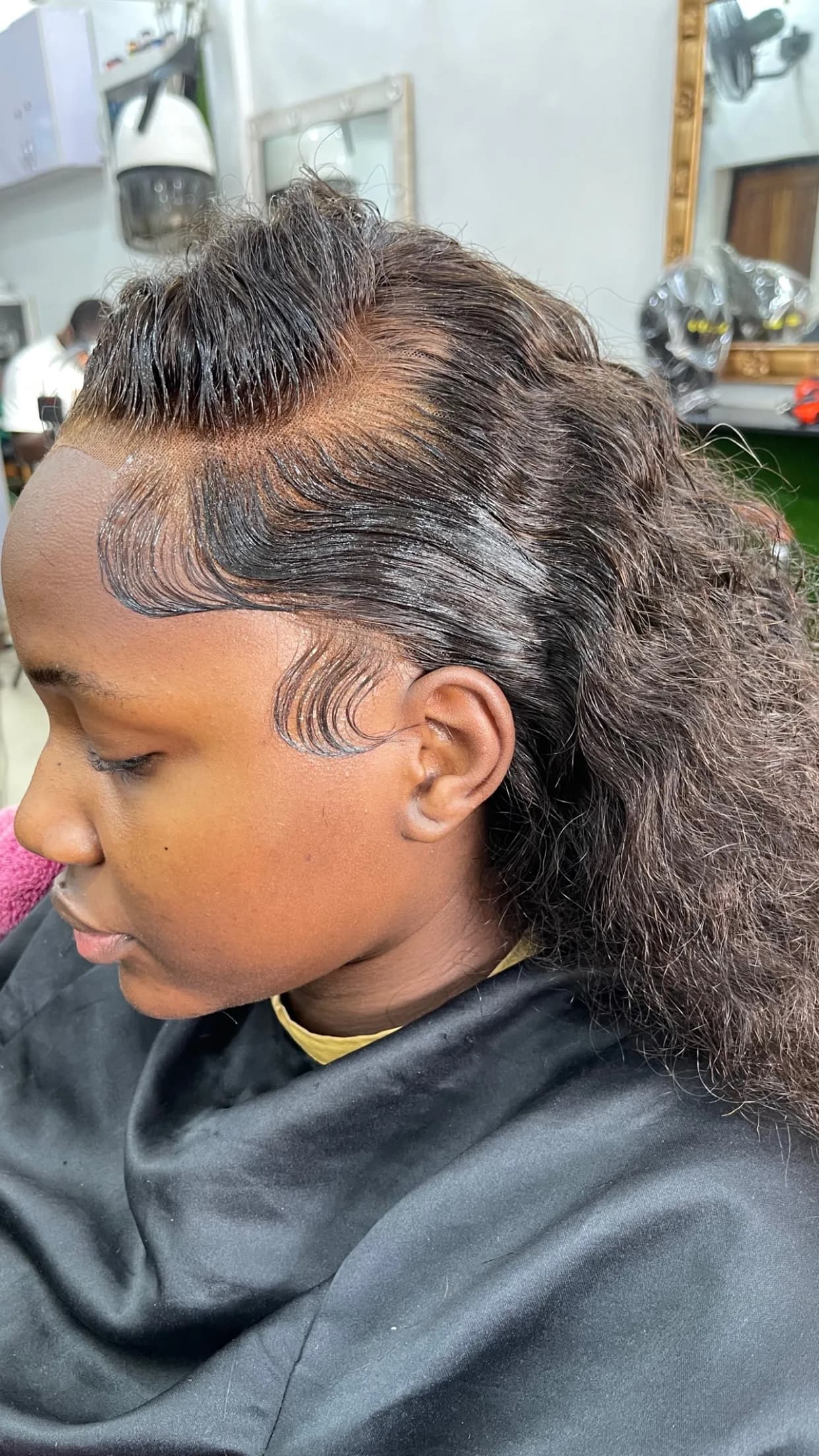 Curly frontal with laid edges