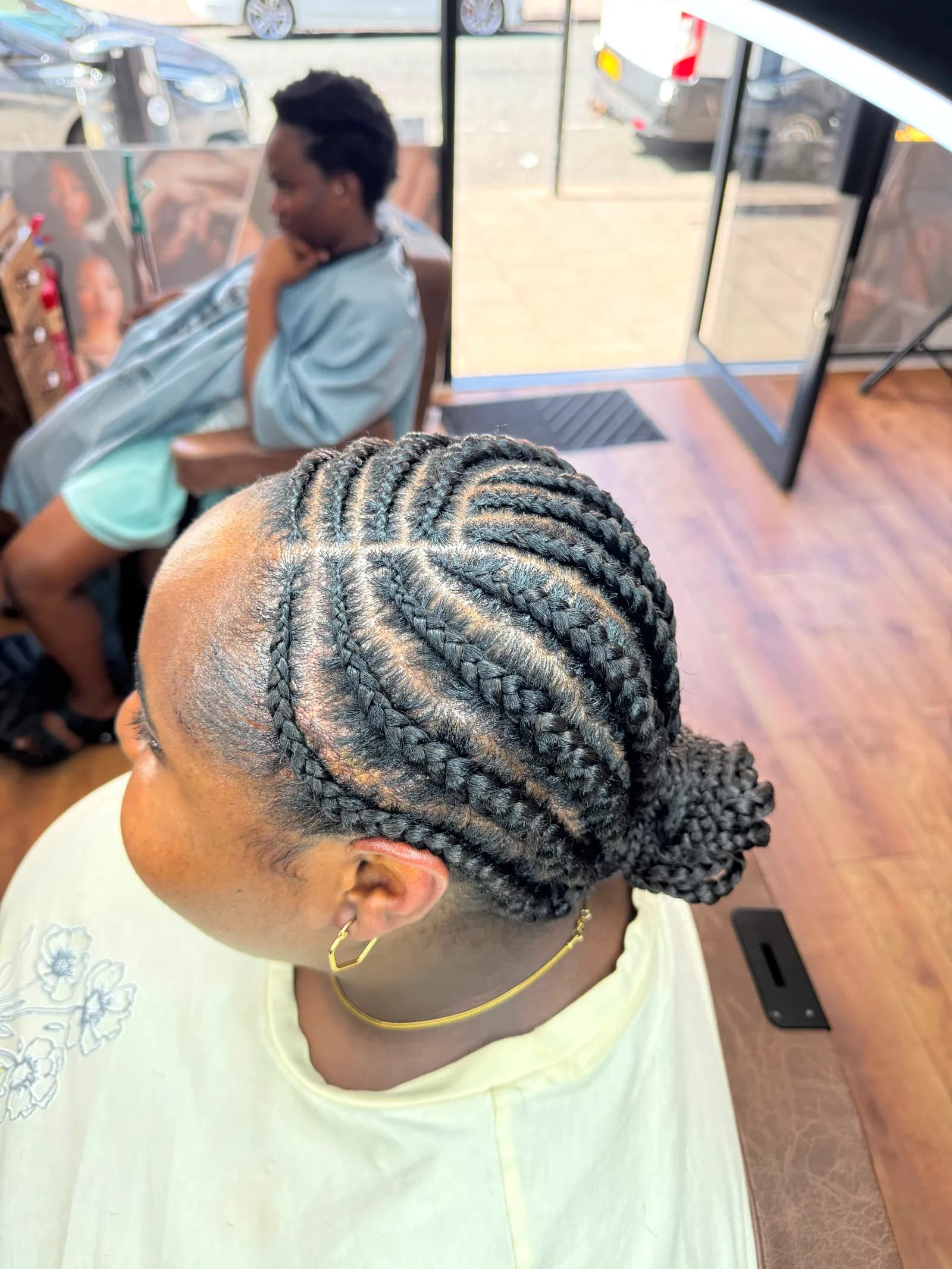 Feed-in cornrows gathered into a bun